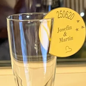 a glass with a tag on it